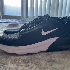 Nike Woman’s Black and White Athletic Sneakers